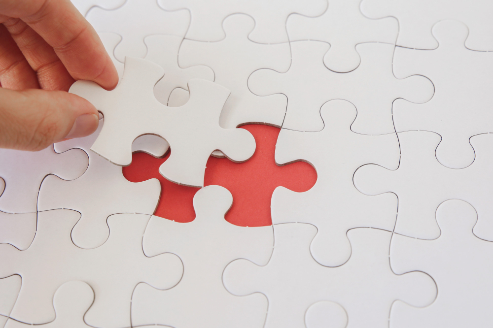 hands-with-jigsaw-puzzle-pieces-business-strategy-planning